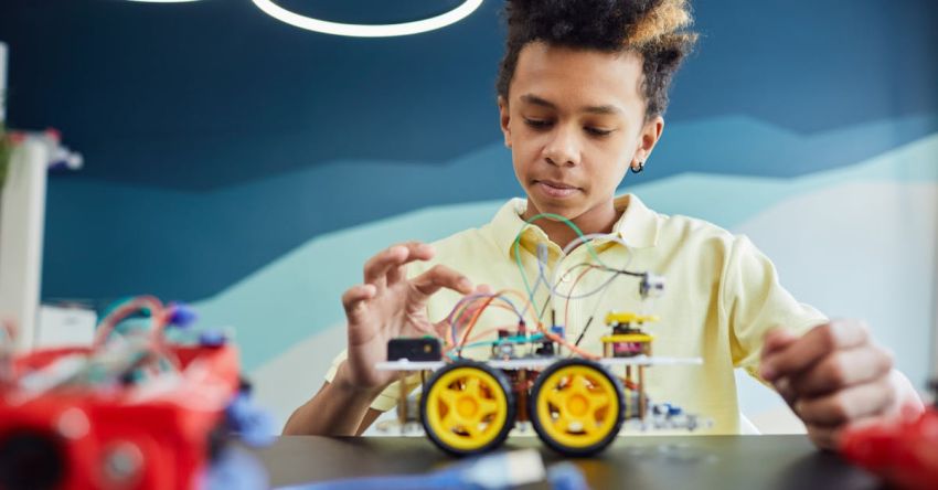 Machine Learning Models - A Boy Touching the Wire of a Wheeled Toy