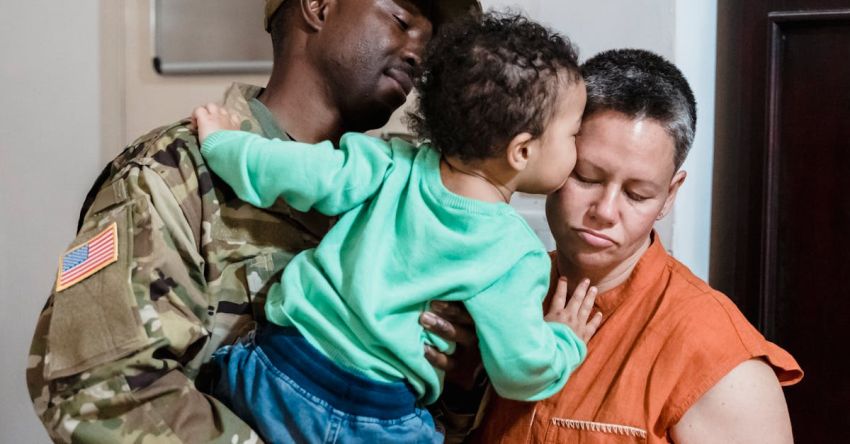 Microservices Deployment - Soldier Holding Son Kissing his Mother