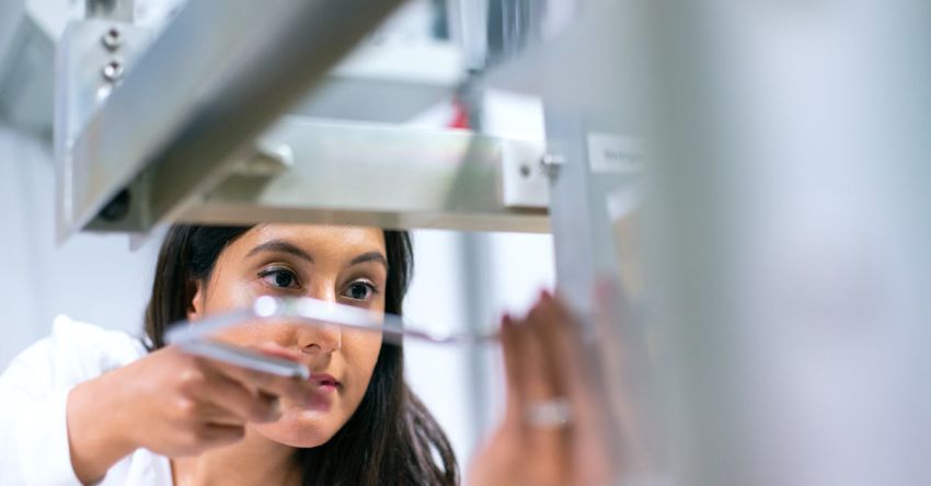 Microservices Testing - Photo Of Female Engineer Working On An Equipment