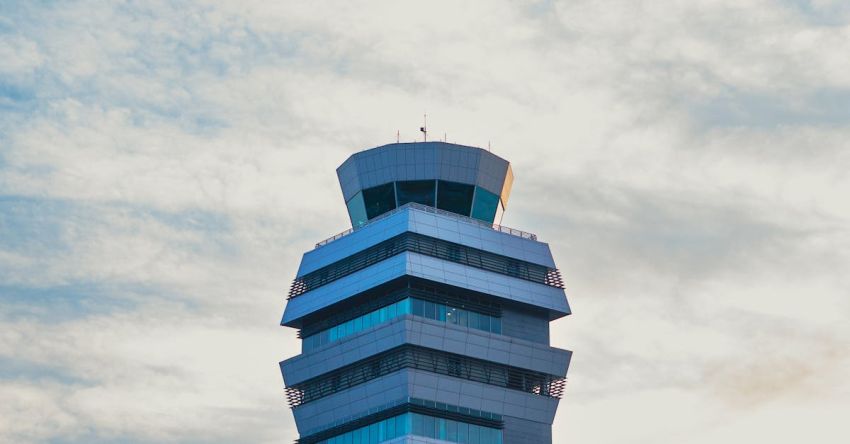 Version Control - An airport control tower with a blue sky in the background