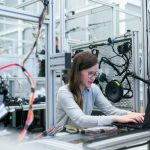 Regression Testing - Photo Of Female Engineer Working On Her Workspace